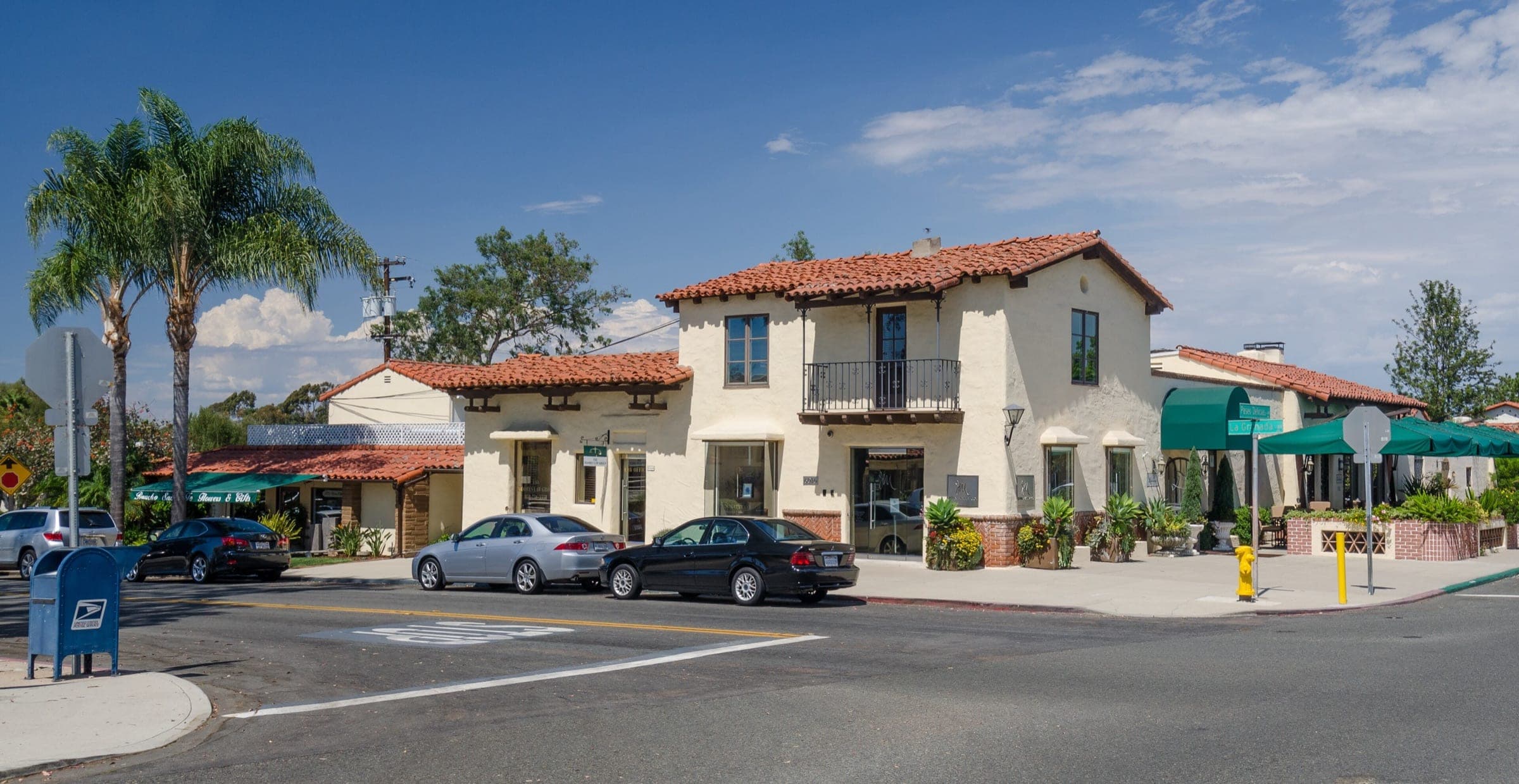 Spanish Colonial Revival buildings with red tile roofs in the village of Rancho Santa Fe